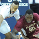 Former Florida State Center Michael Ojo (right) died of a heart attack in Serbia in August after recovering from COVID-19.